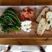 An appetizer of Broccolini, summer toast, summer tomato and housemade ricotta at Paesano's on Friday. Daniel Brenner I AnnArbor.com